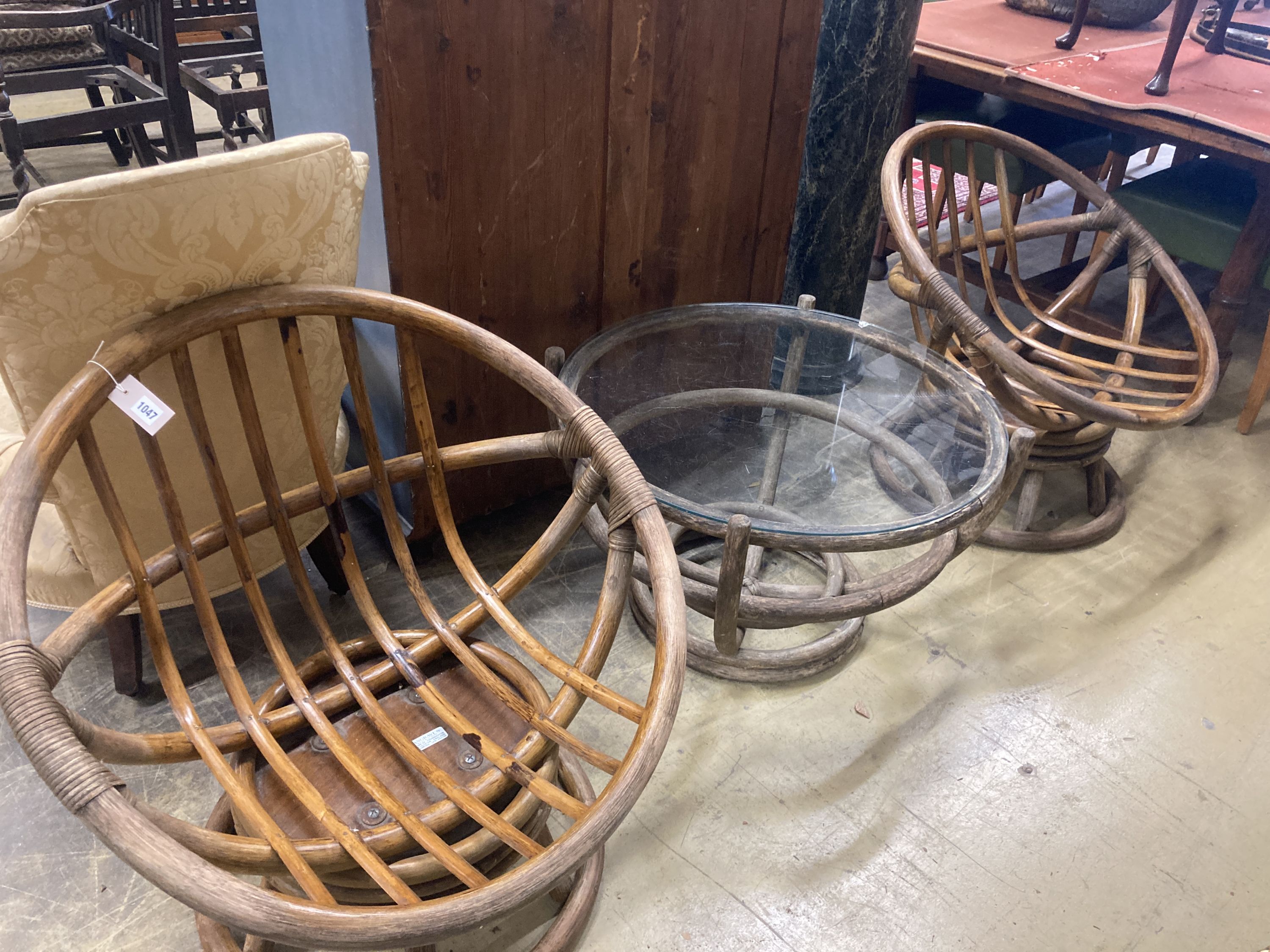 A pair of 1970's Angraves bamboo chairs and an occasional table, 76cm diameter